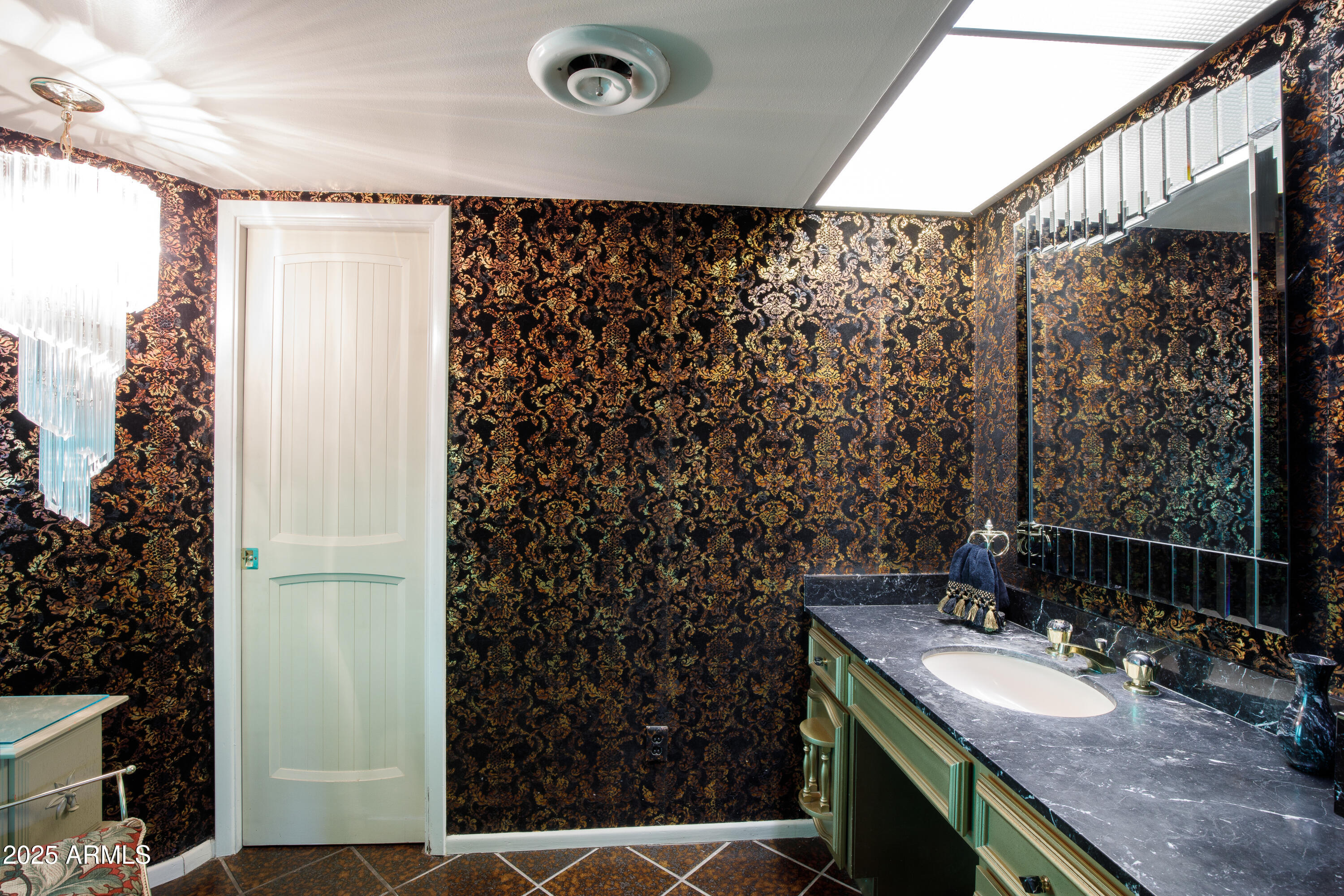 7125 North 2nd Place Phoenix, AZ 85020 - Photo 13 of 30 a bathroom with a granite countertop sink and a mirror