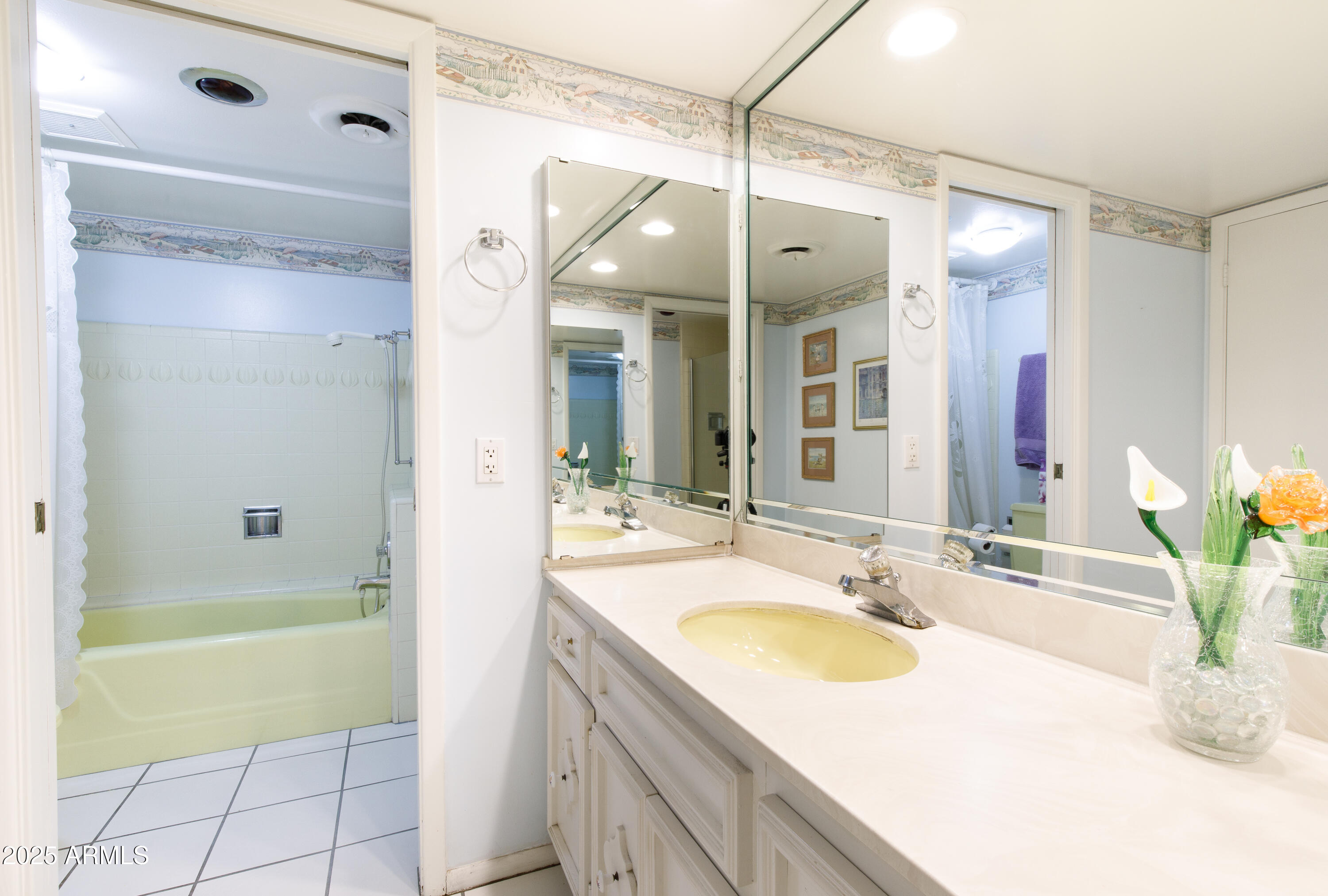 7125 North 2nd Place Phoenix, AZ 85020 - Photo 15 of 30 a bathroom with a granite countertop sink a mirror a bathtub and shower