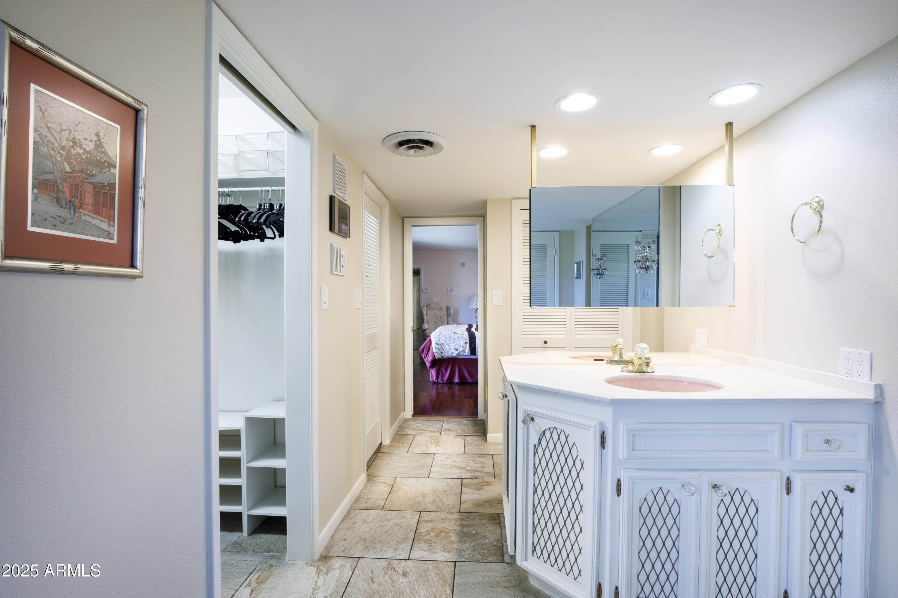 7125 North 2nd Place Phoenix, AZ 85020 - Photo 19 of 30 a bathroom with a double vanity sink a mirror and a shower