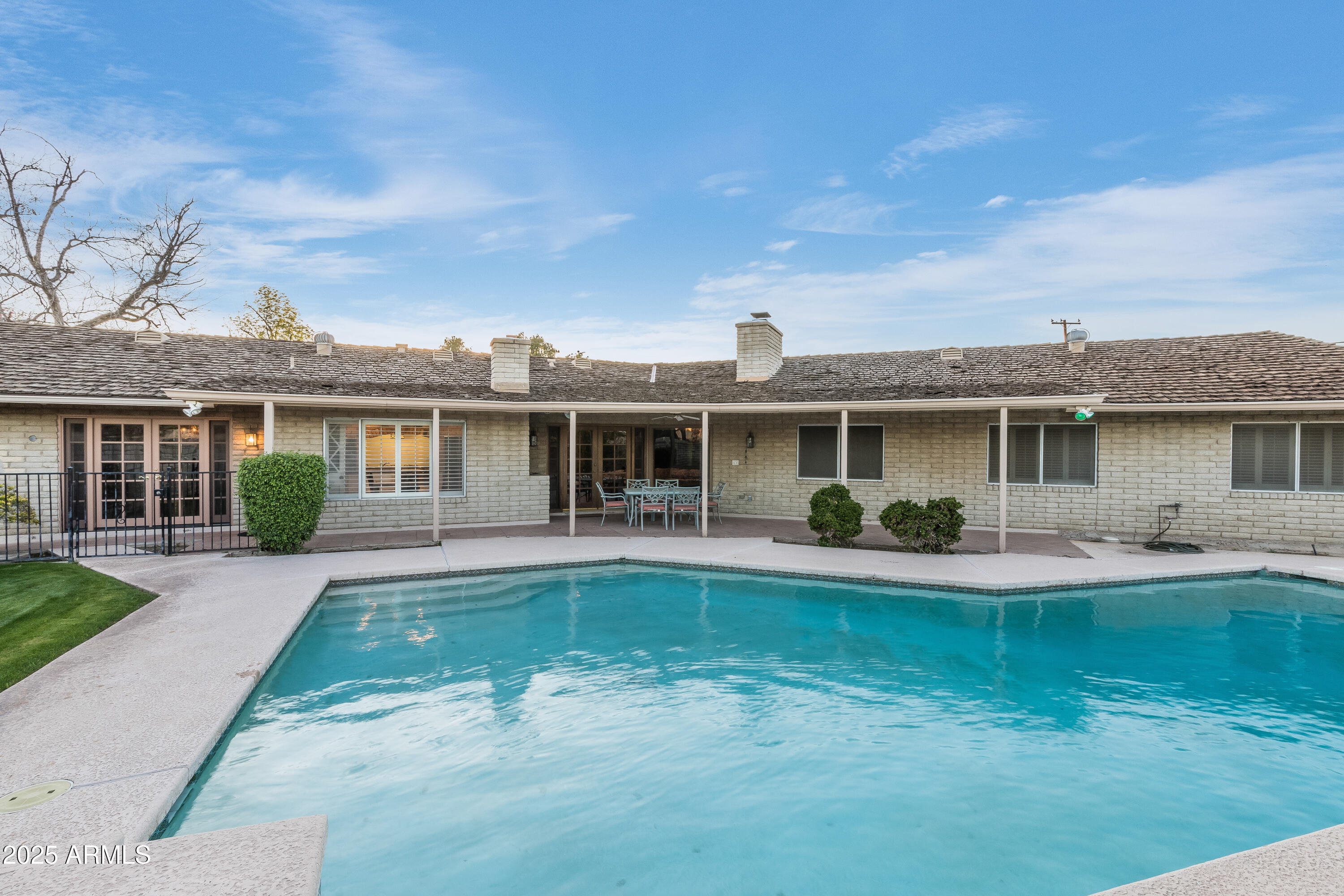 7125 North 2nd Place Phoenix, AZ 85020 - Photo 25 of 30 front view of a house with a yard