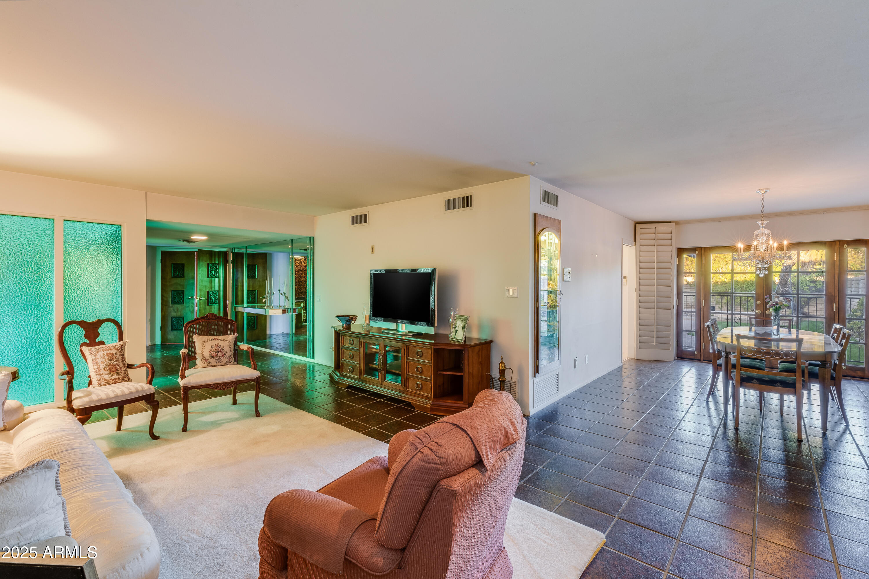 7125 North 2nd Place Phoenix, AZ 85020 - Photo 4 of 30 a living room with furniture and a flat screen tv