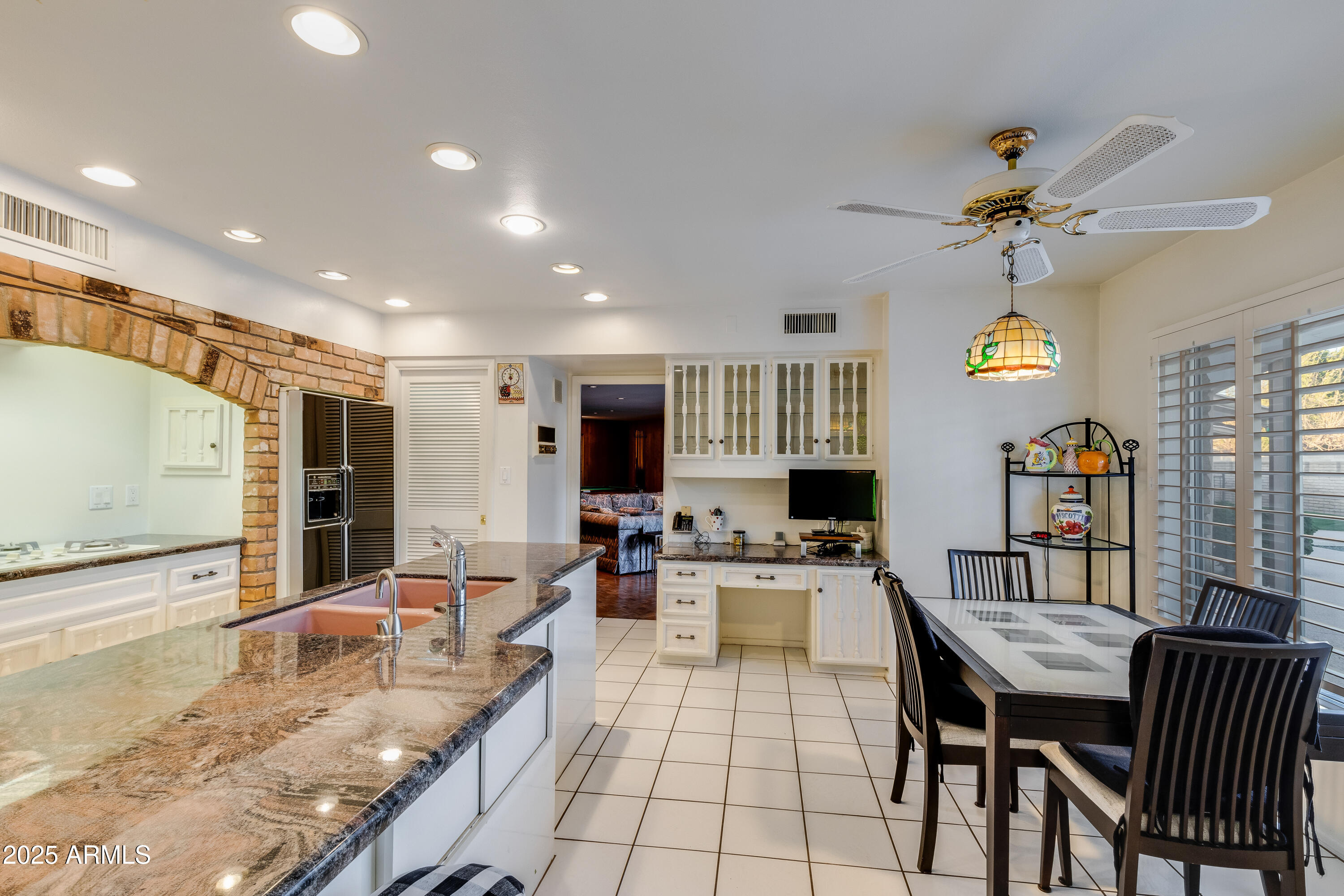 7125 North 2nd Place Phoenix, AZ 85020 - Photo 5 of 30 a large kitchen with a table and chairs