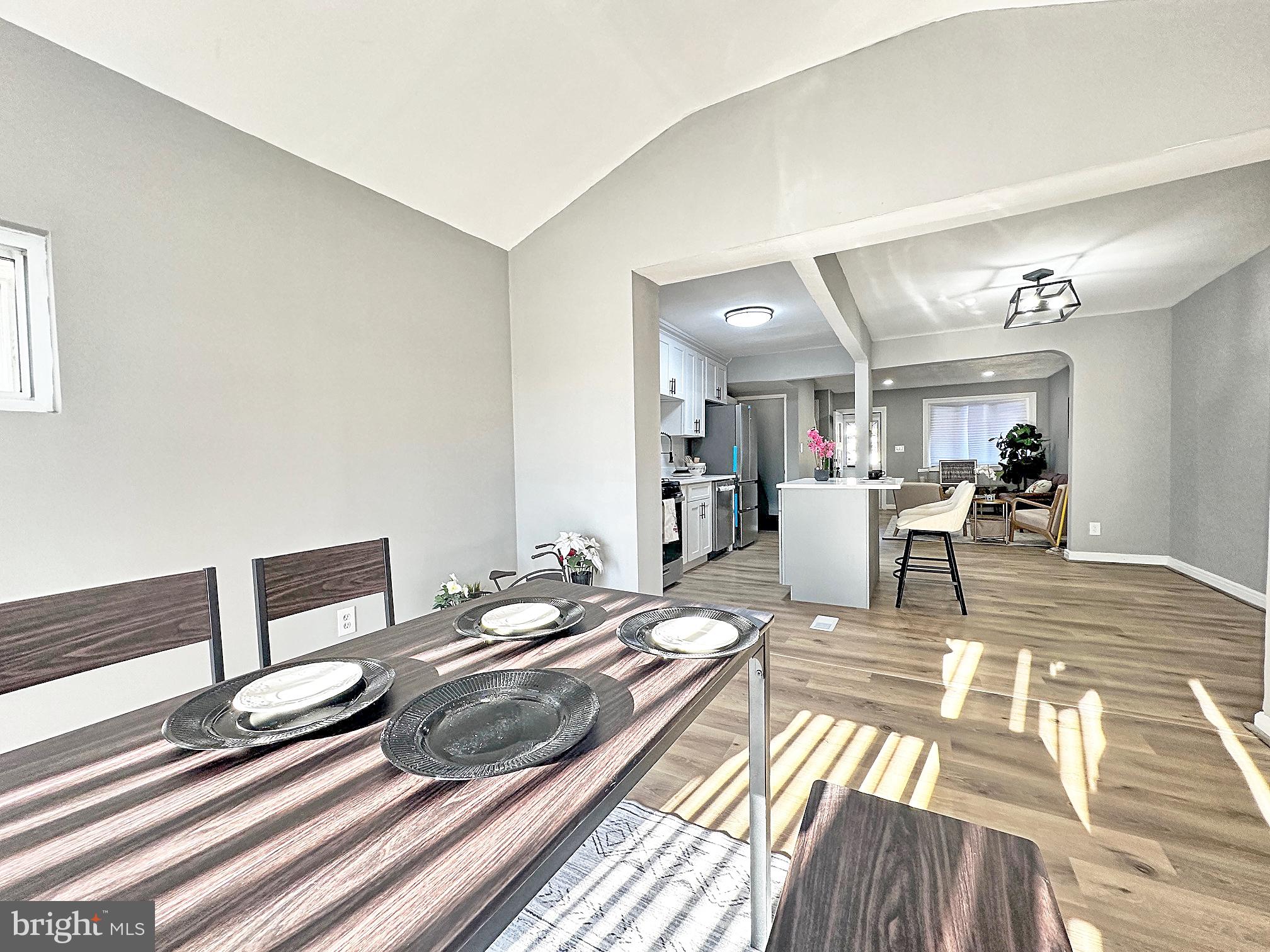 116 Hillvale Road Baltimore, MD 21229 - Photo 13 of 26 a living room with furniture and a table