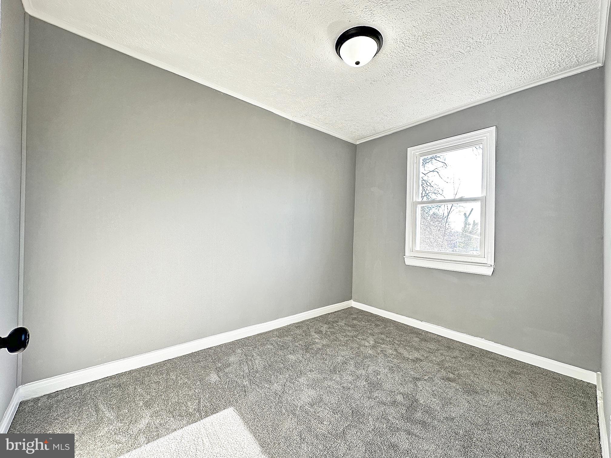 116 Hillvale Road Baltimore, MD 21229 - Photo 16 of 26 an empty room with a window