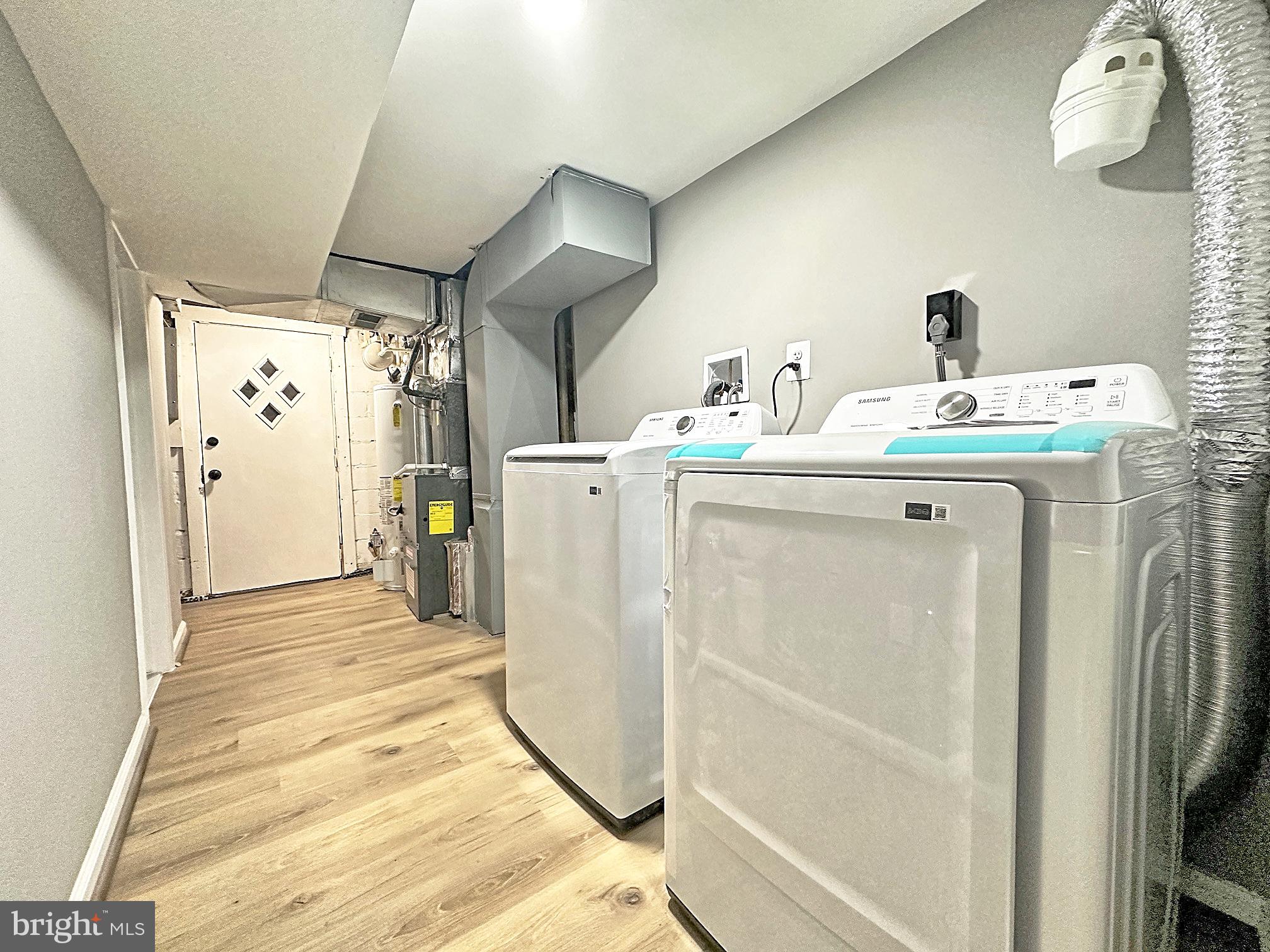 116 Hillvale Road Baltimore, MD 21229 - Photo 22 of 26 a room with closet a mirror and a shower