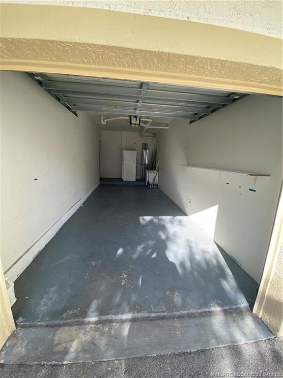 467 Southeast Kitching Circle Stuart, FL 34994 - Photo 2 of 11 a view of a garage