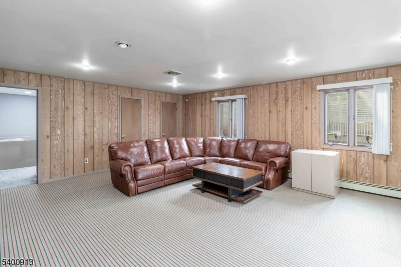 1 Wenonah Avenue Rockaway, NJ 07866 - Photo 25 of 34 a living room with furniture and a large window