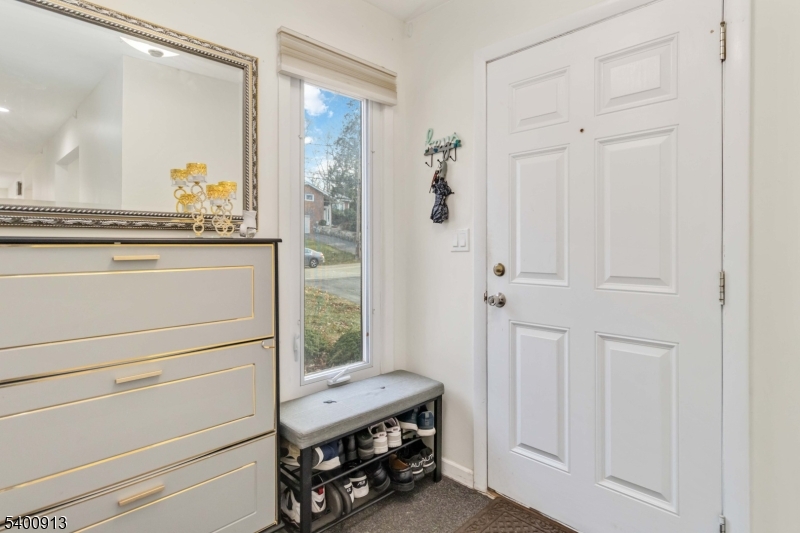 1 Wenonah Avenue Rockaway, NJ 07866 - Photo 33 of 34 a room with a closet and a mirror