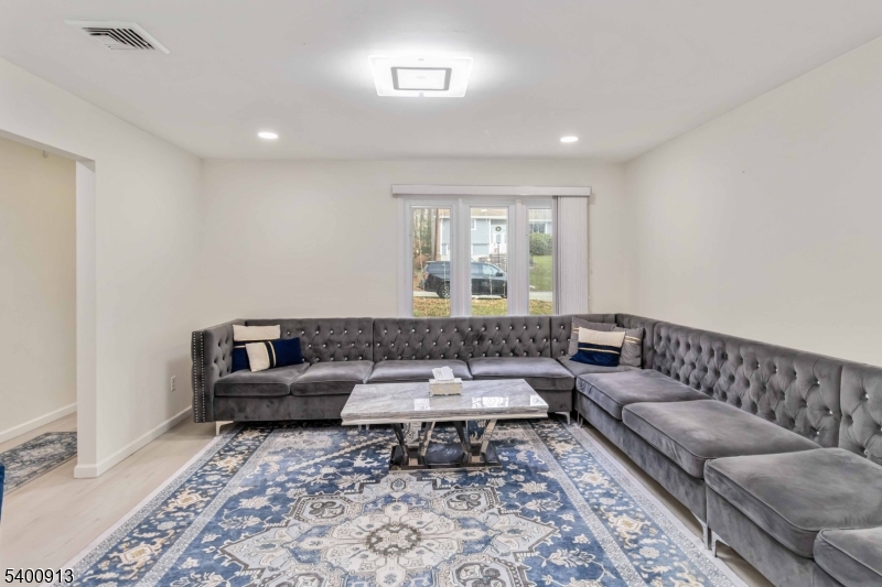 1 Wenonah Avenue Rockaway, NJ 07866 - Photo 7 of 34 a living room with furniture and a rug