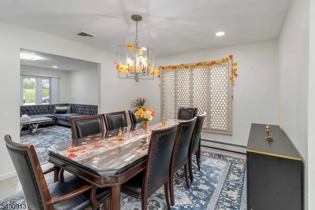 a view of a dining room with furniture