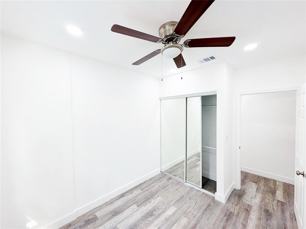 778 Northwest 80th Street Miami, FL 33150 - Photo 14 of 35 a view of a hallway with wooden floor