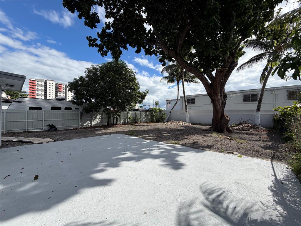 778 Northwest 80th Street Miami, FL 33150 - Photo 27 of 35 a view of a street with a tree