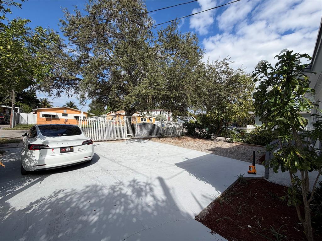 778 Northwest 80th Street Miami, FL 33150 - Photo 3 of 35 a car parked on the side of the road