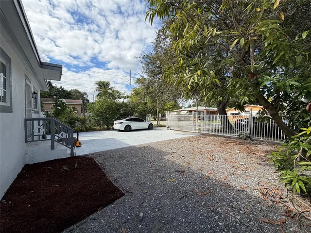 a view of street with parked cars