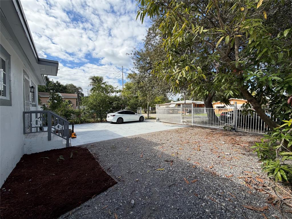 778 Northwest 80th Street Miami, FL 33150 - Photo 4 of 35 a view of street with parked cars