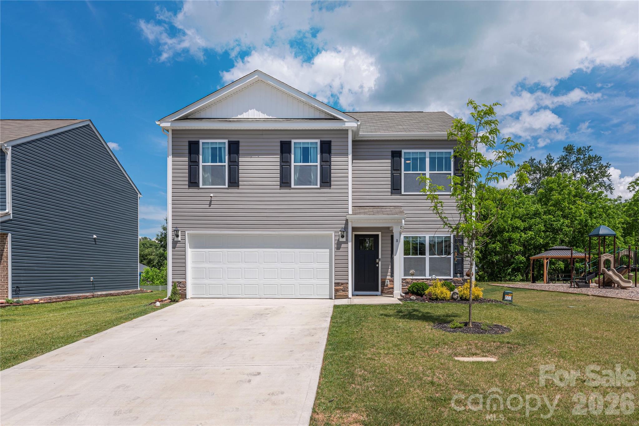 8 Madelyn Drive Clyde, NC 28721 - Photo 29 of 43 a front view of a house with a yard