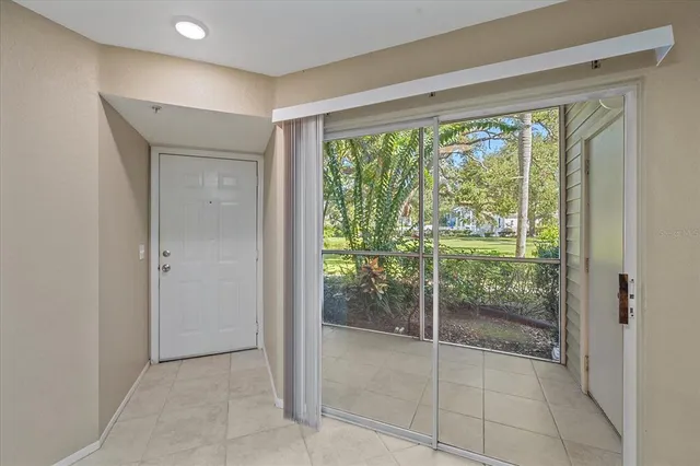 a view of an empty room and window
