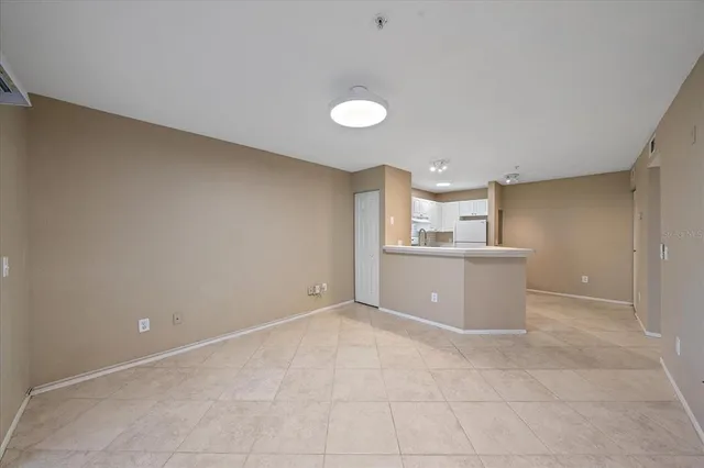 a view of a kitchen with a sink cabinets and window