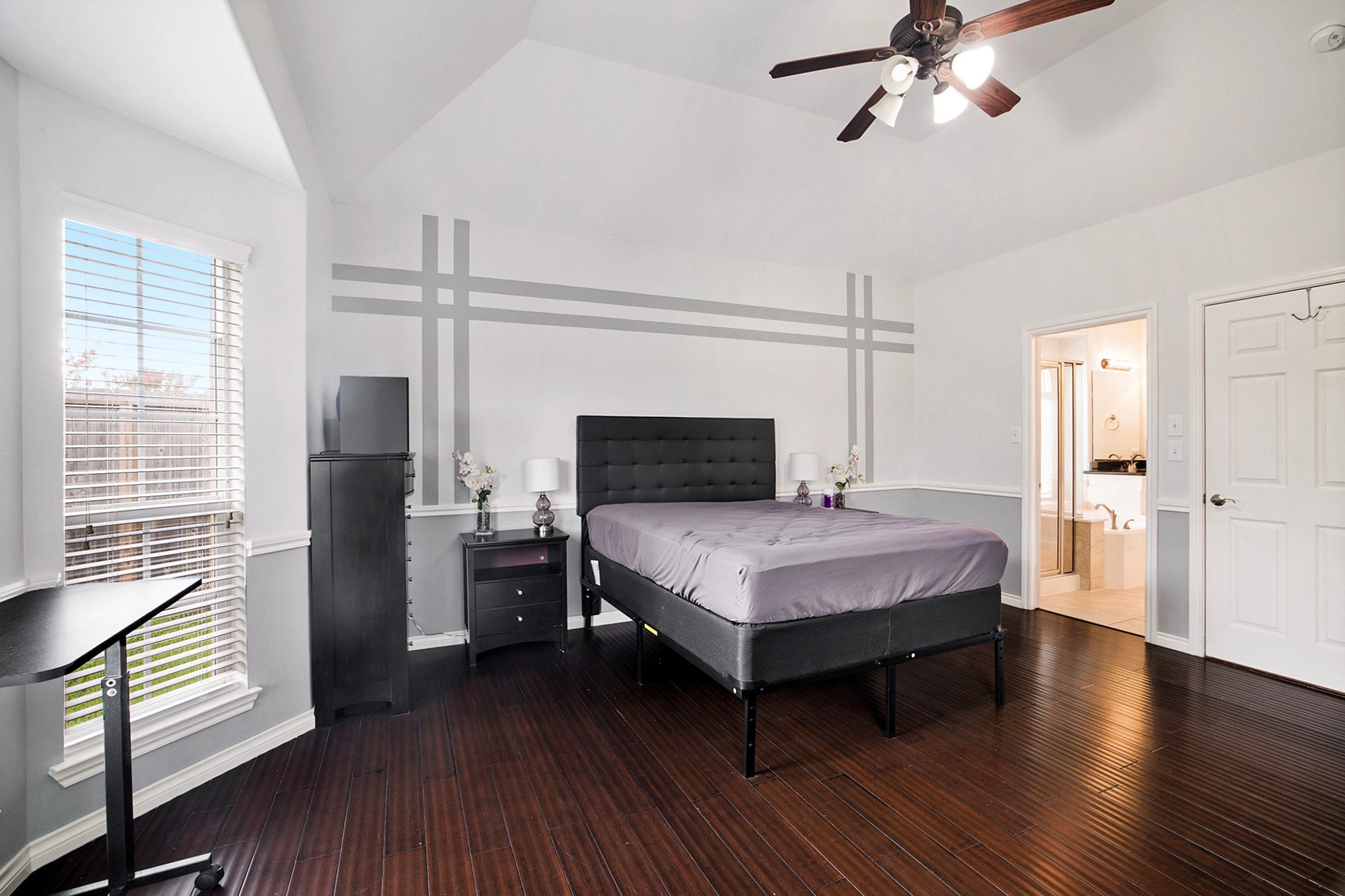 20692 Oakhurst Meadows Drive Porter, TX 77365 - Photo 15 of 37 a bedroom with a bed and wooden floor