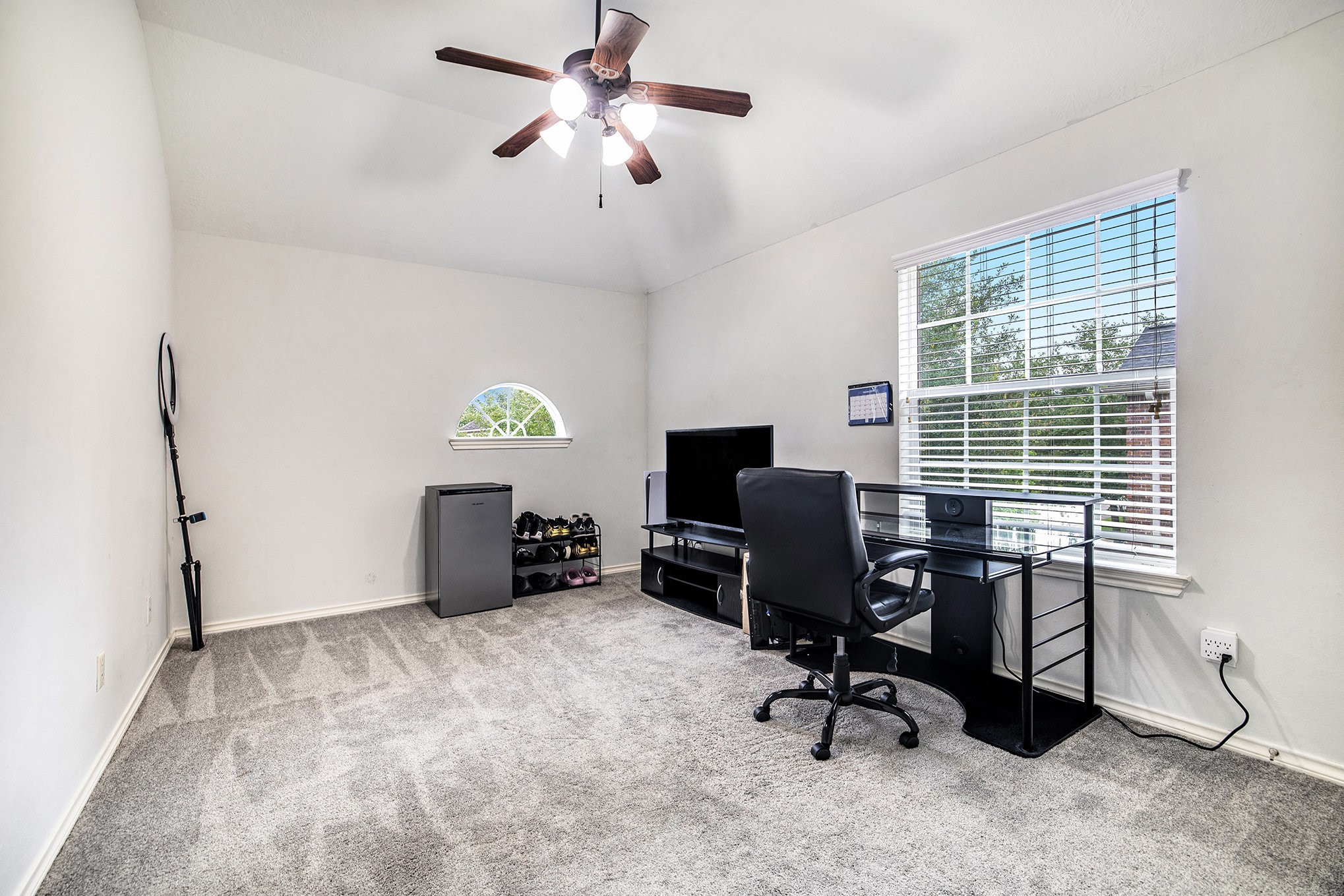 20692 Oakhurst Meadows Drive Porter, TX 77365 - Photo 26 of 37 a view of a workspace with furniture and a window