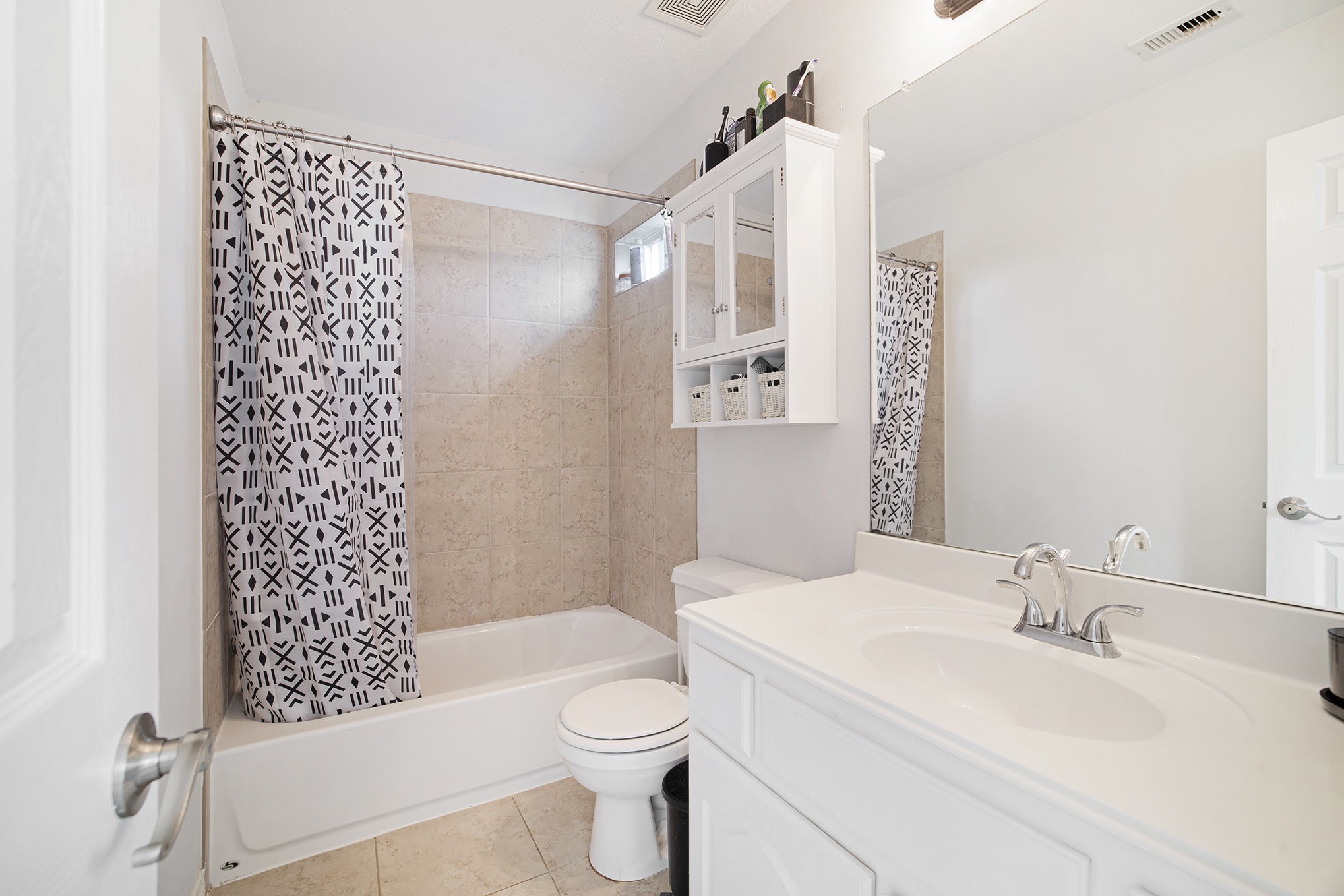 20692 Oakhurst Meadows Drive Porter, TX 77365 - Photo 28 of 37 a bathroom with a sink a toilet and shower