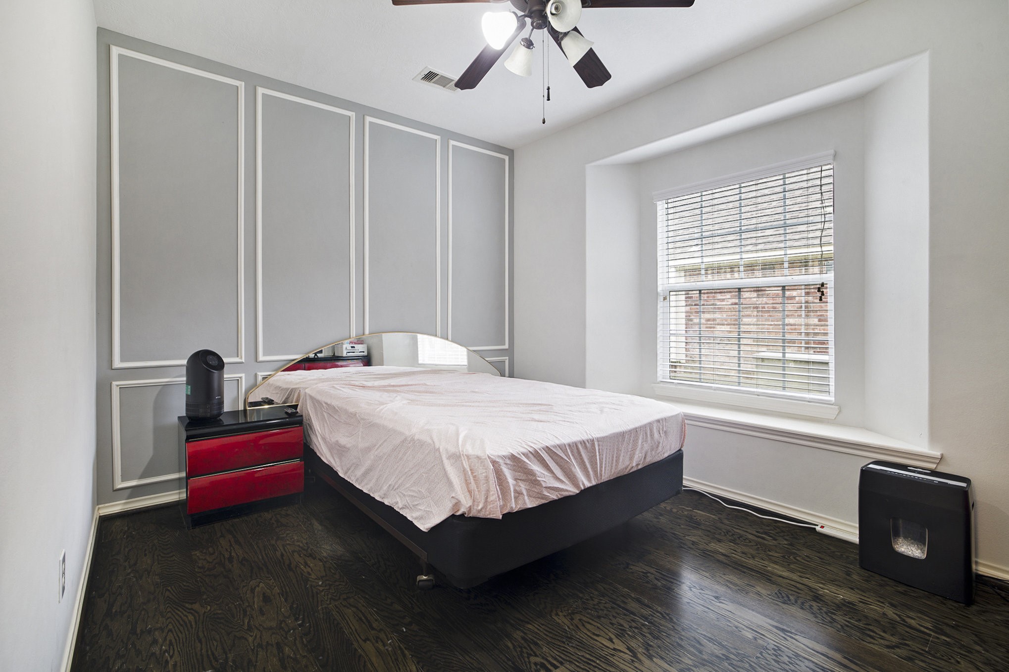 20692 Oakhurst Meadows Drive Porter, TX 77365 - Photo 29 of 37 a bedroom with a bed wooden floor and window