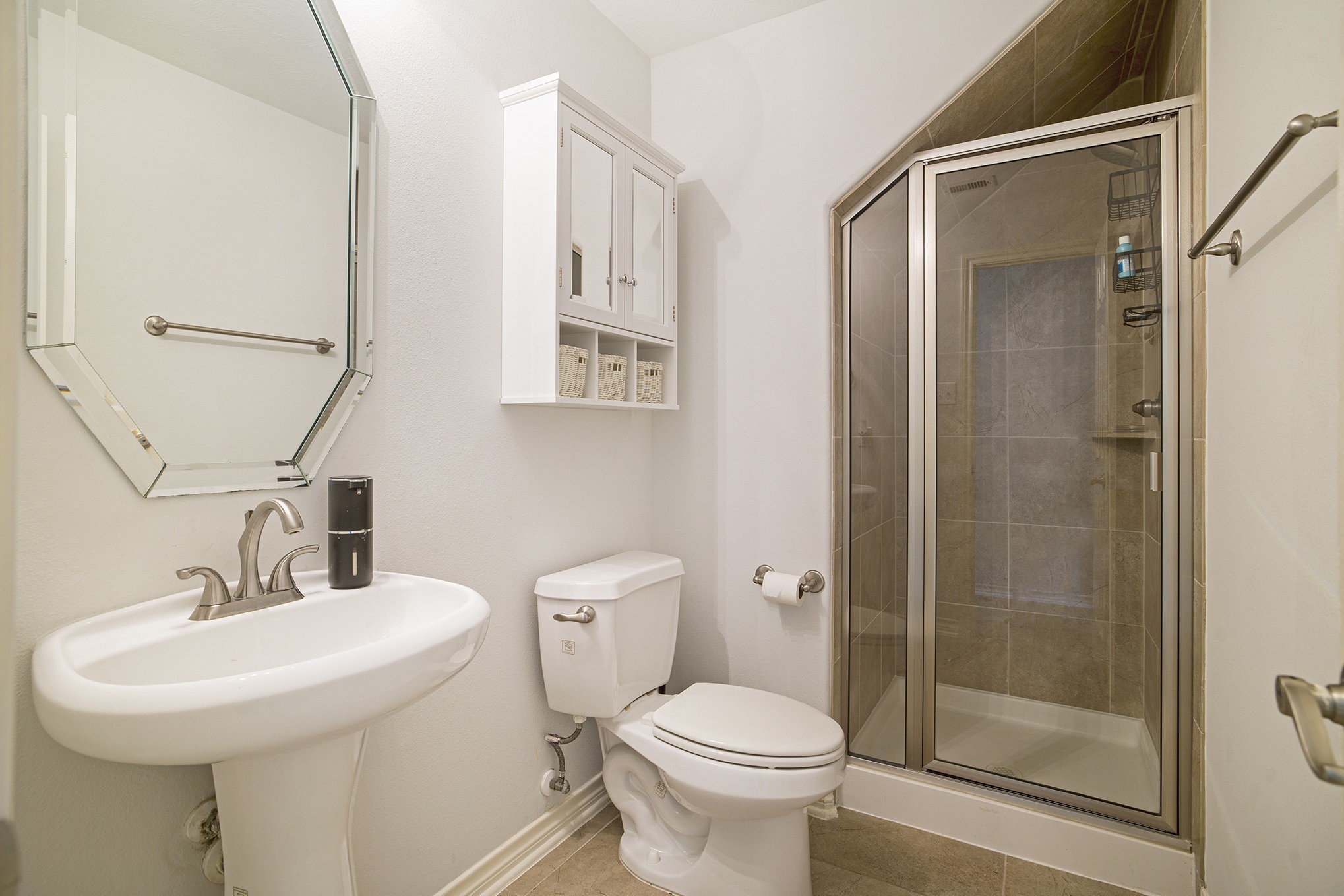 20692 Oakhurst Meadows Drive Porter, TX 77365 - Photo 30 of 37 a bathroom with a sink toilet and shower