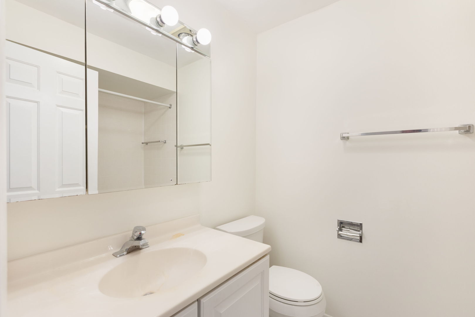 435 Ridge Road, Unit 108 Wilmette, IL 60091 - Photo 11 of 18 a bathroom with a sink a toilet and shower