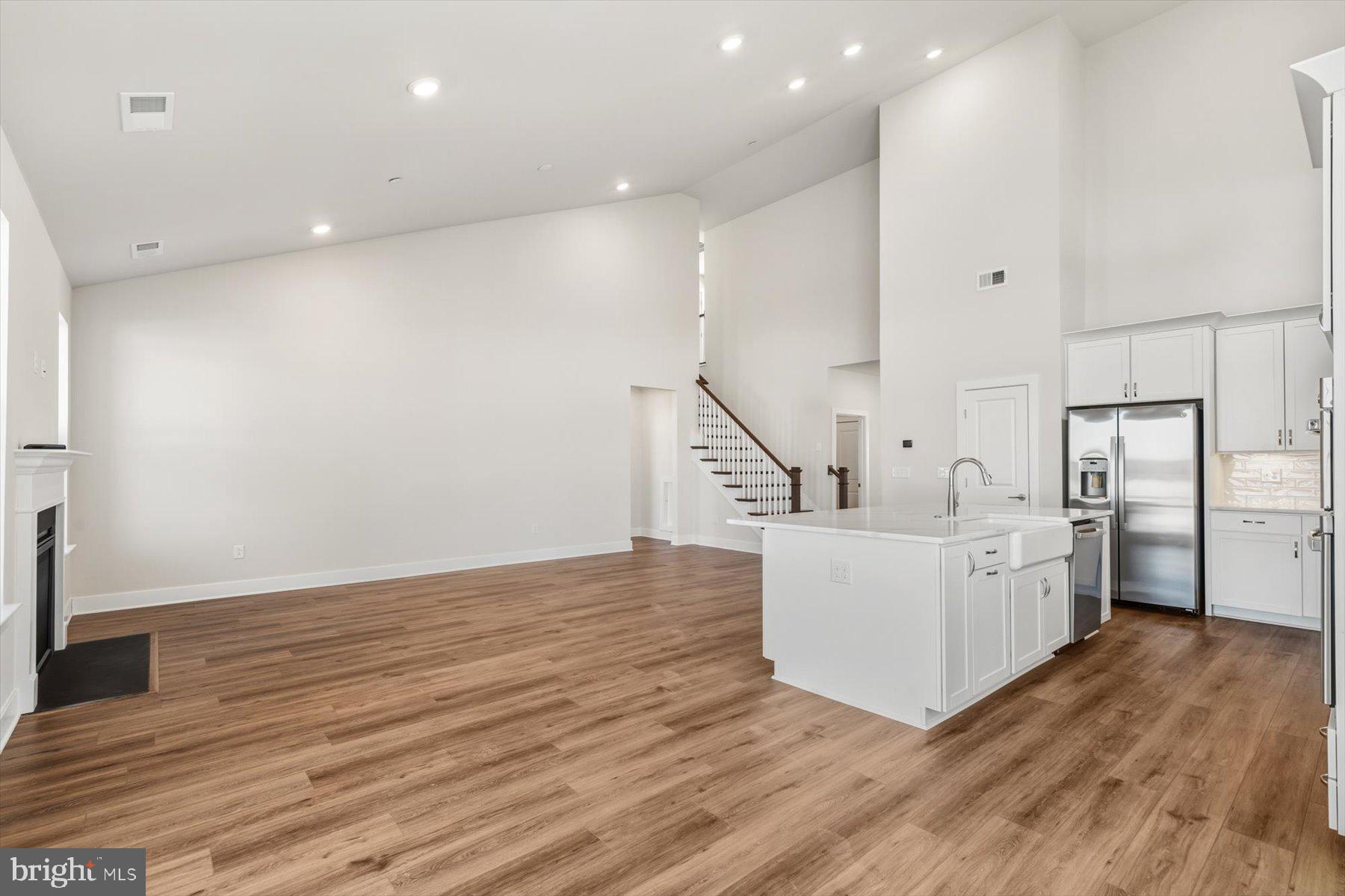 104 Sunbeam Way Milton, DE 19968 - Photo 12 of 56 a view of kitchen with wooden floor