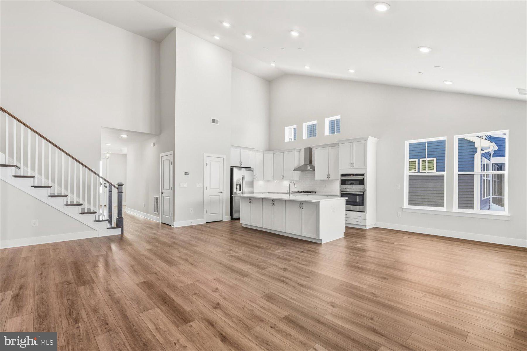 104 Sunbeam Way Milton, DE 19968 - Photo 13 of 56 a view of kitchen with wooden floor and electronic appliances