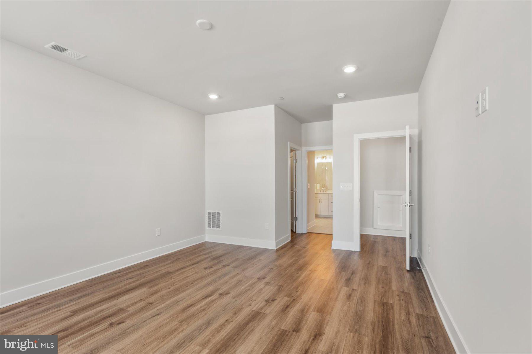 104 Sunbeam Way Milton, DE 19968 - Photo 30 of 56 a view of hallway with wooden floor