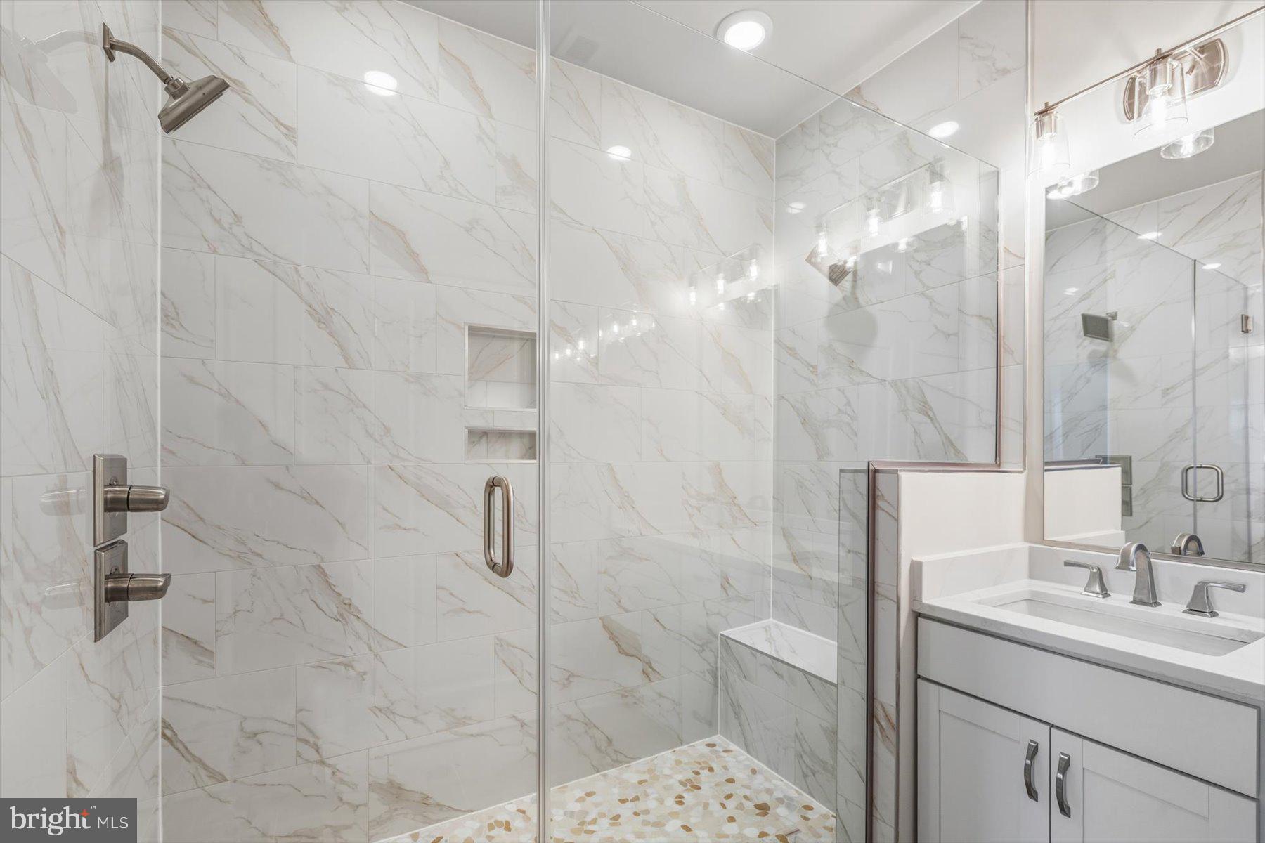 104 Sunbeam Way Milton, DE 19968 - Photo 32 of 56 a bathroom with a sink shower and a mirror