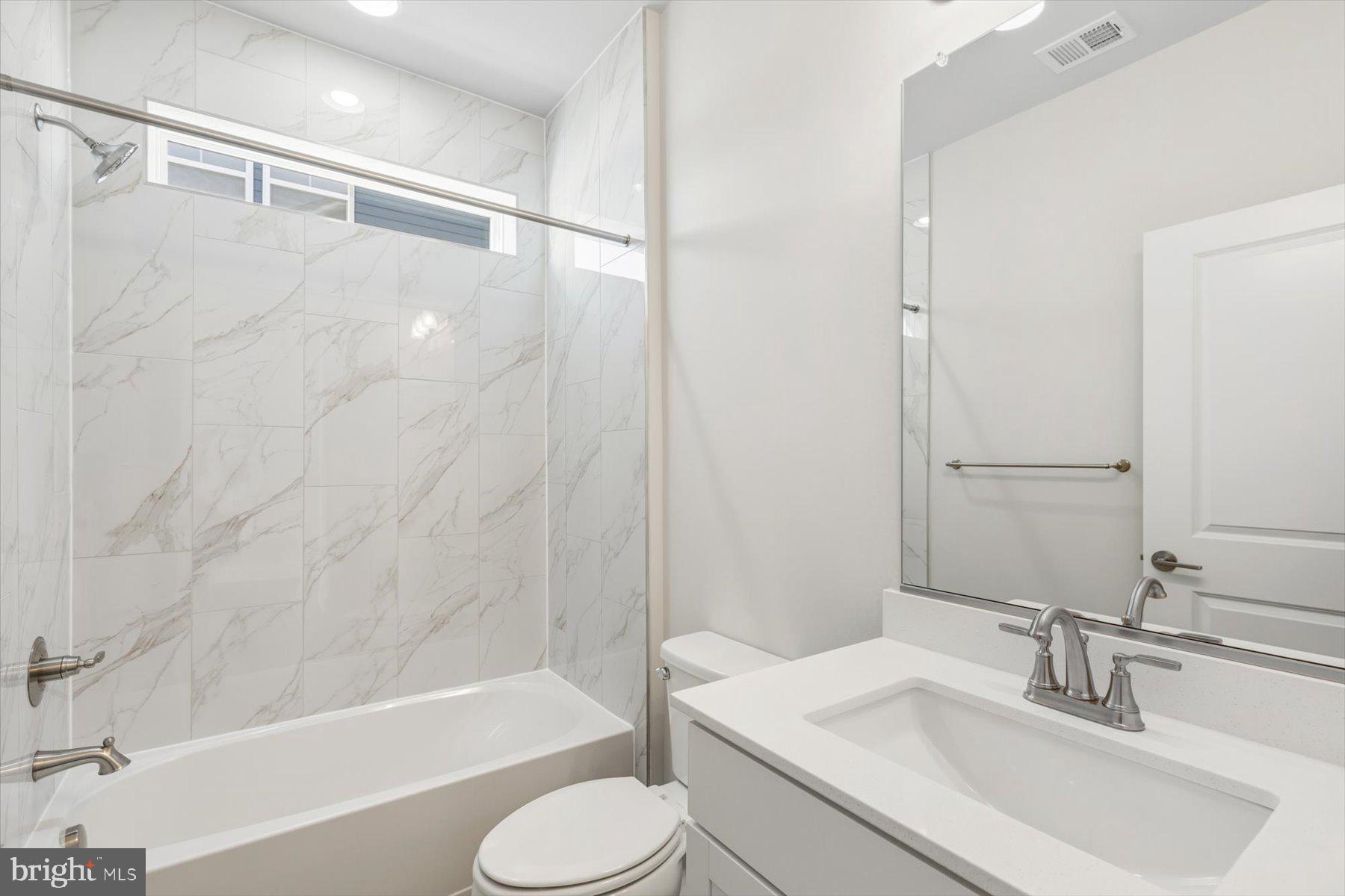 104 Sunbeam Way Milton, DE 19968 - Photo 37 of 56 a bathroom with a sink toilet and shower