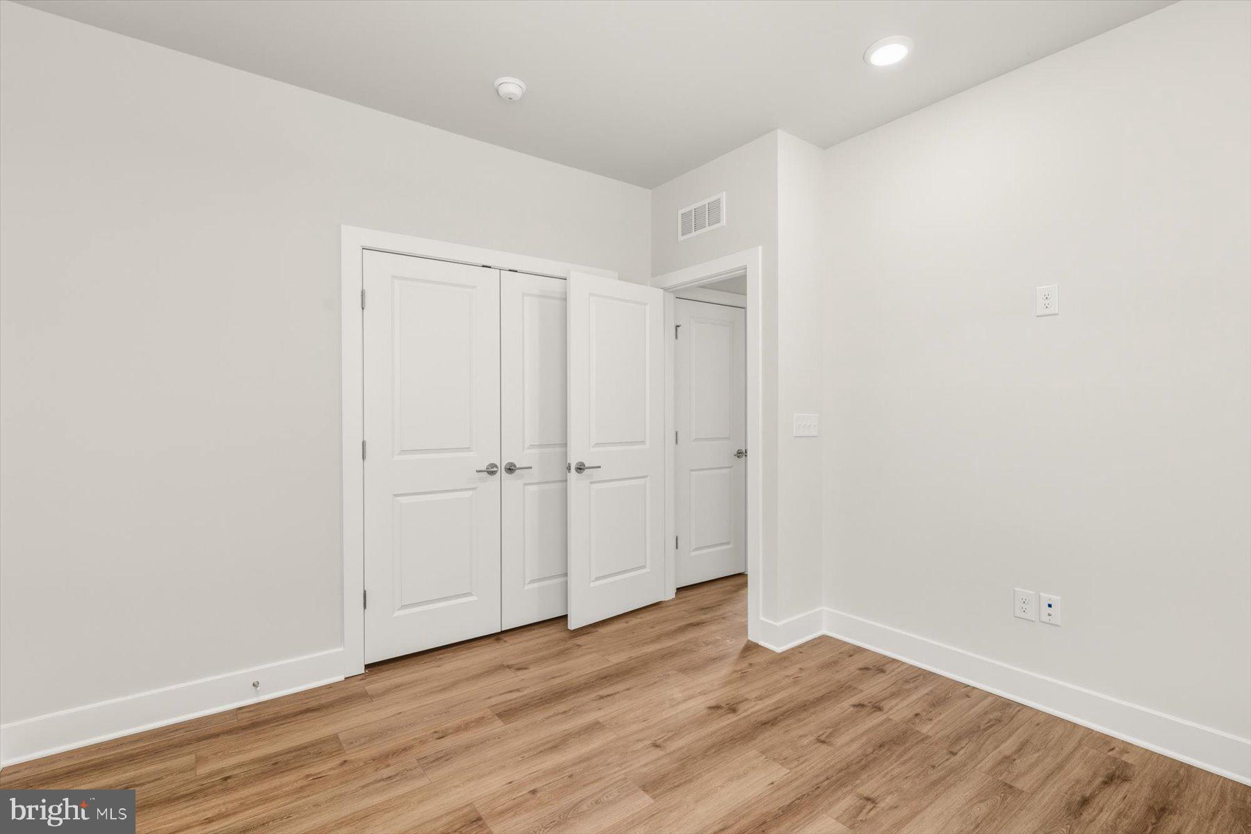 104 Sunbeam Way Milton, DE 19968 - Photo 41 of 56 a view of an empty room with wooden floor