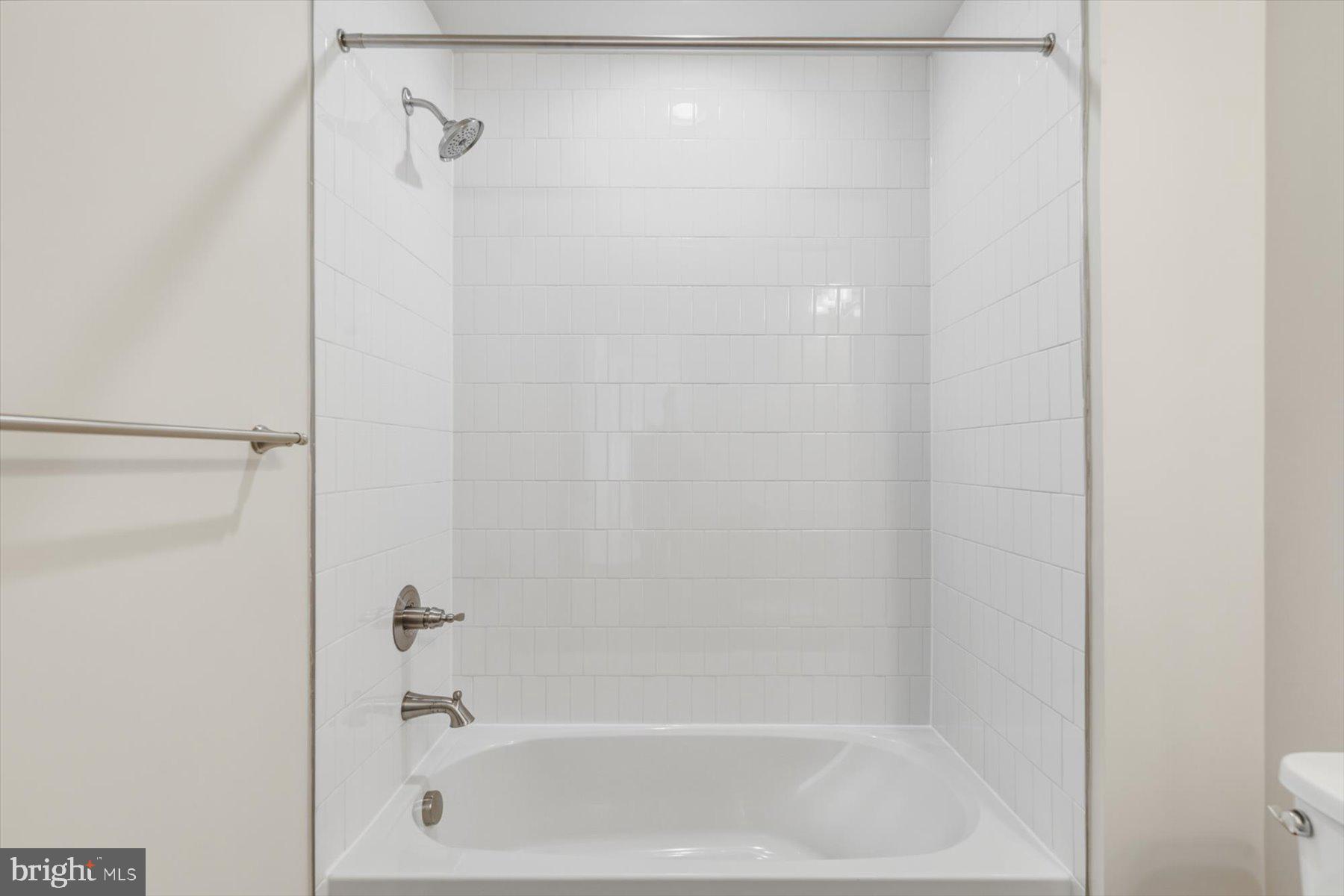 104 Sunbeam Way Milton, DE 19968 - Photo 44 of 56 a close up of a bathtub curtain