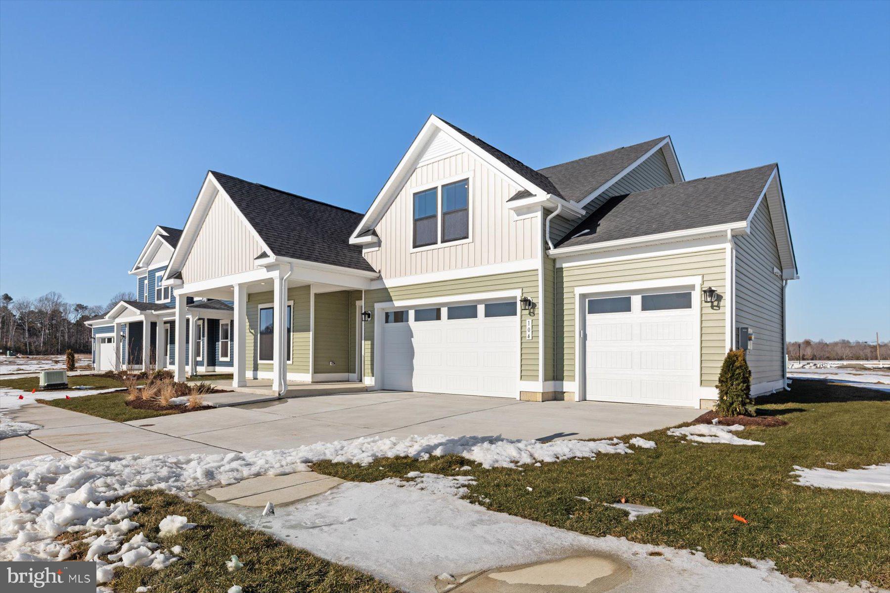 104 Sunbeam Way Milton, DE 19968 - Photo 52 of 56 a front view of a house with a yard