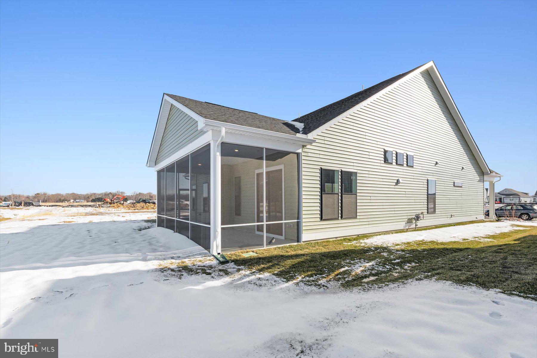 104 Sunbeam Way Milton, DE 19968 - Photo 54 of 56 a view of a house with a yard