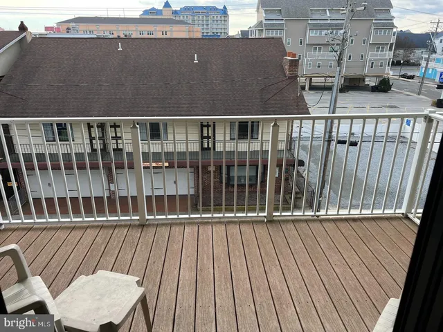 a view of a balcony with city view