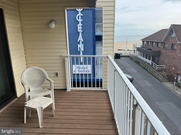a view of an ocean and a building