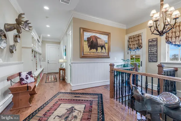 a bedroom with bed and a couch