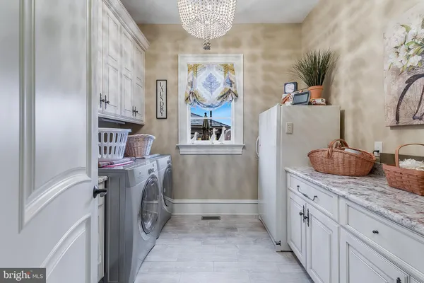 a bedroom with bed and window