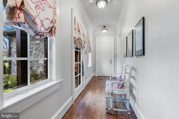a utility room with lots of different colored cloths