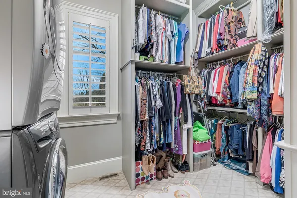 a front view of building with yard and green space