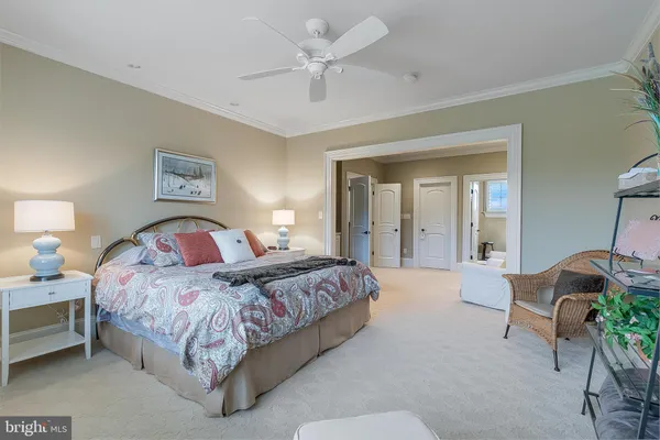 an aerial view of a house with swimming pool garden and patio