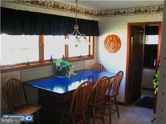 27 Harvard Road Audubon, NJ 08106 - Photo 5 of 12 a view of a dining room with furniture and wooden floor