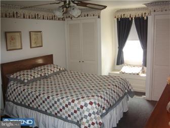 27 Harvard Road Audubon, NJ 08106 - Photo 8 of 12 a bedroom with bed and a window