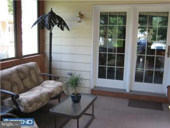 27 Harvard Road Audubon, NJ 08106 - Photo 10 of 12 a living room with furniture and a potted plant