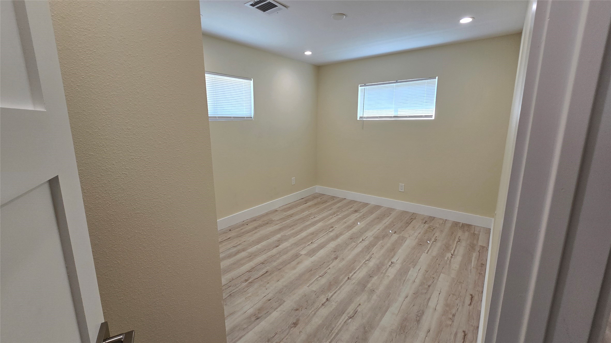3741 Seabrook Street Houston, TX 77021 - Photo 7 of 50 a view of room with wooden floor