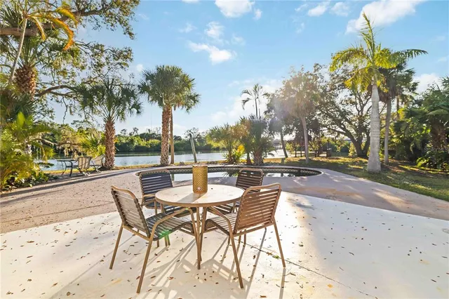 a view of a backyard with a patio