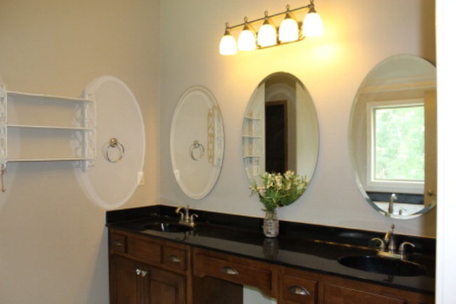 163 Gregory Road Forsyth, GA 31029 - Photo 13 of 20 a view of living room with a large window and potted plant